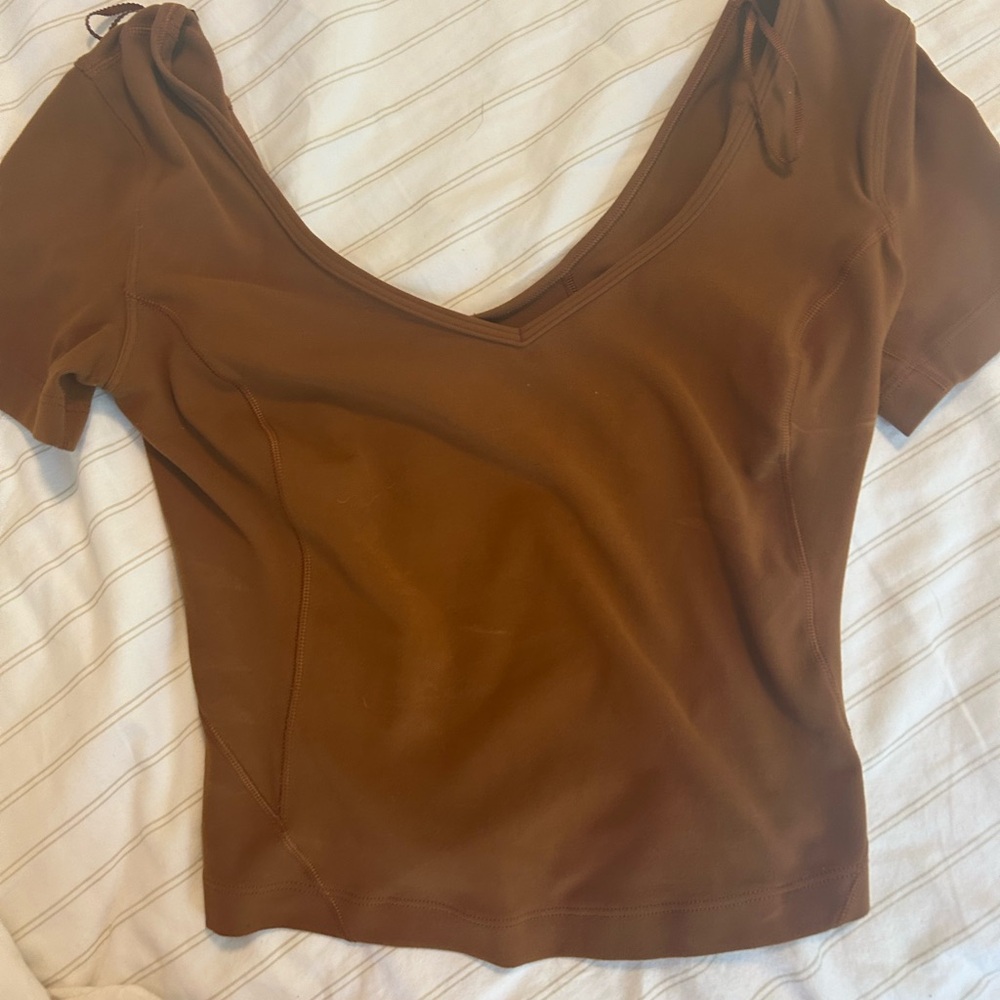 Selling brown lulu T Shirt size 0.